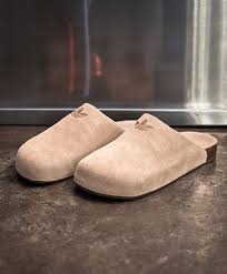 Summer slides and sandals at Gallery Streetwear Kelowna — featuring top brands and stylish warm-weather footwear for men and women