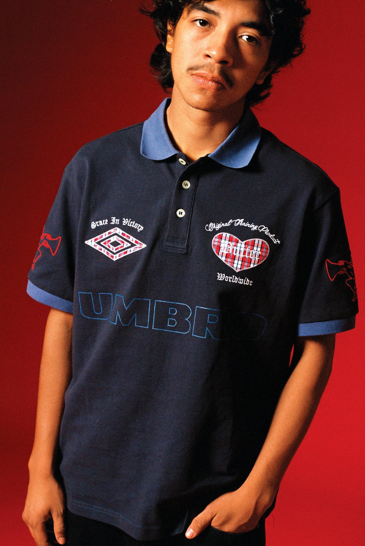 Butter Goods x Umbro Victory Polo Navy / Slate — worn by model