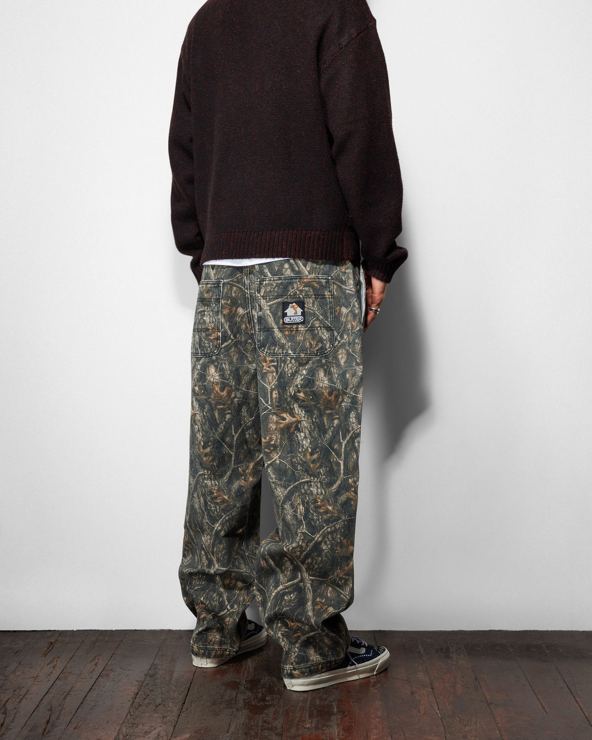 Butter Goods Work Pants Forest Camo — worn by model