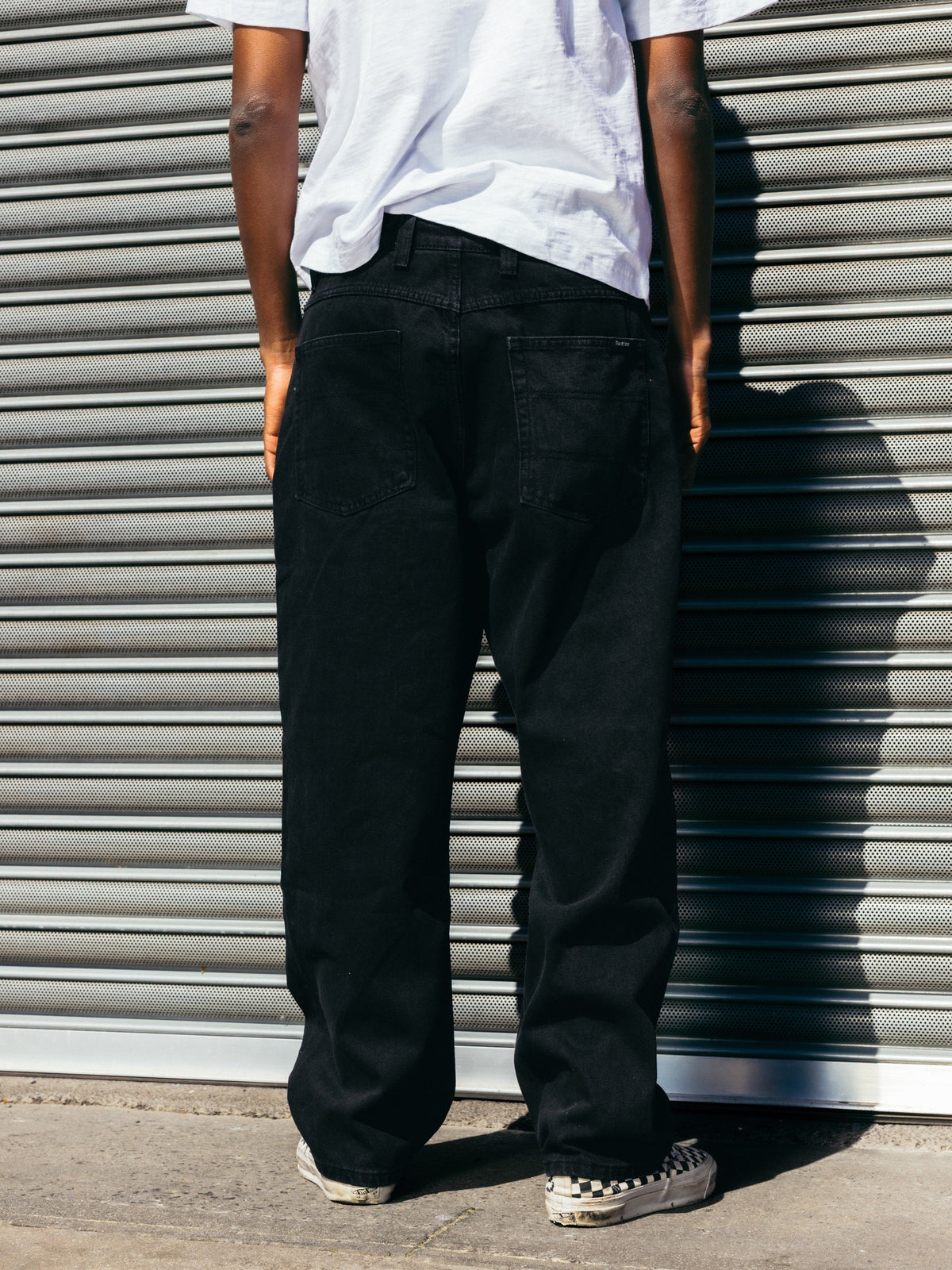 Butter Goods Baggy Denim Jeans Raw Indigo — worn by model