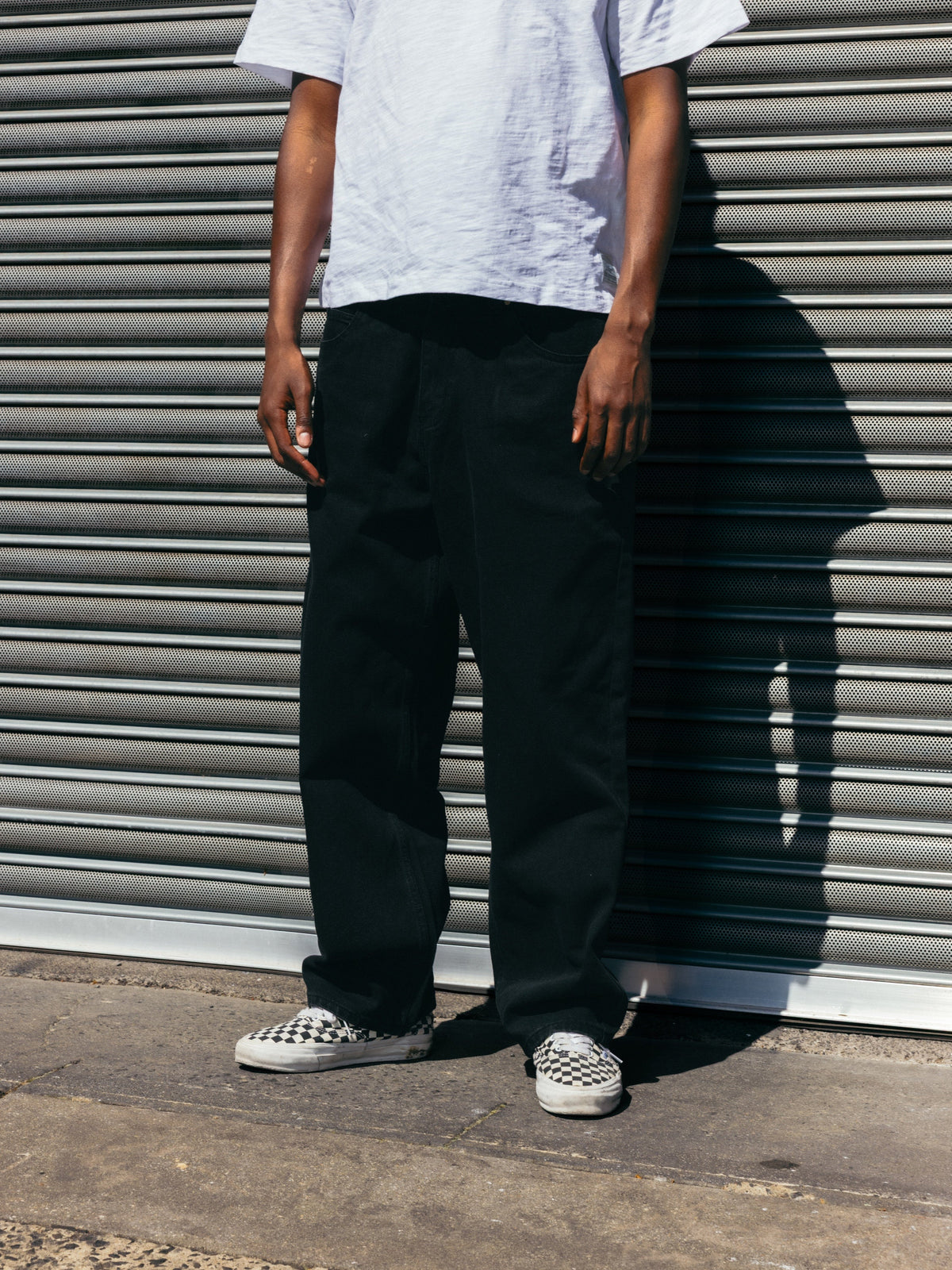 Butter Goods Baggy Denim Jeans Raw Indigo — worn by model
