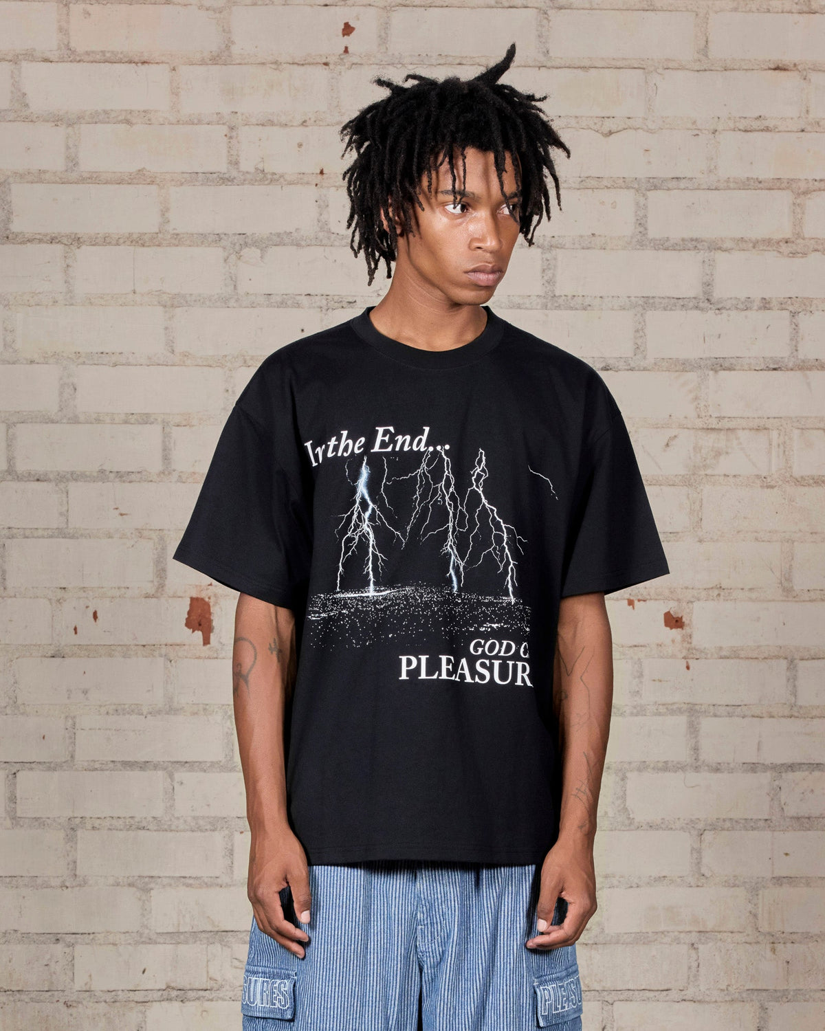 Pleasures End Times T-Shirt Black — black cotton t-shirt worn on model, Gallery Streetwear Canada