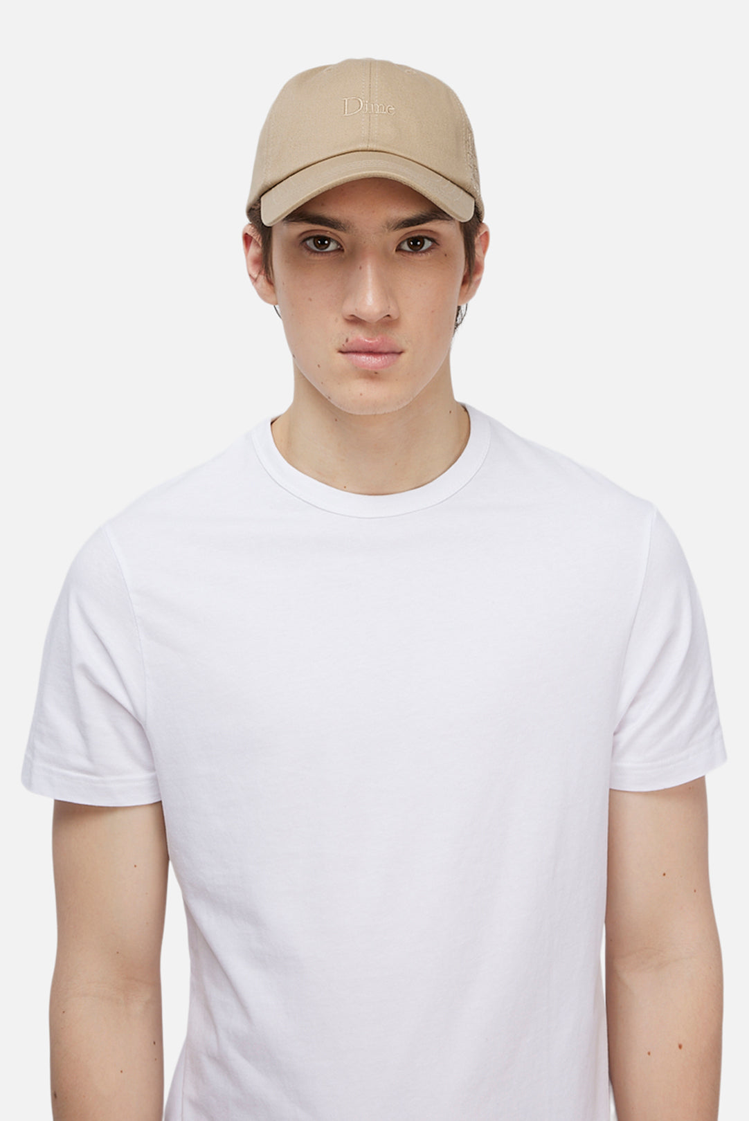 Model wearing the Dime MTL Classic Low Pro Cap in Tan