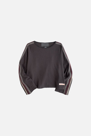 Jungles Jungles Triple Tape Knit in black, front view with triple woven sleeve taping