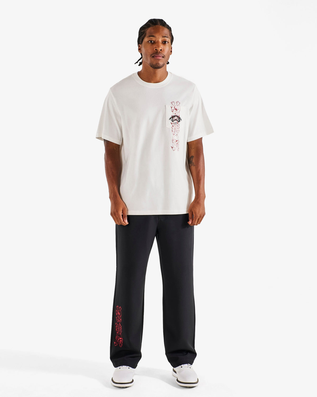 Malbon Vista Insignia Tee off white worn on model