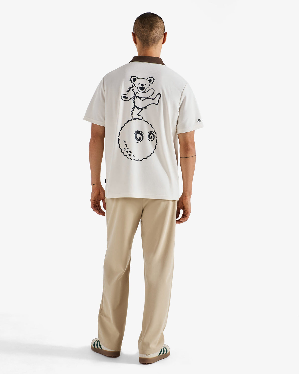 Malbon x Grateful Dead Dancing Buckets Polo ivory detail