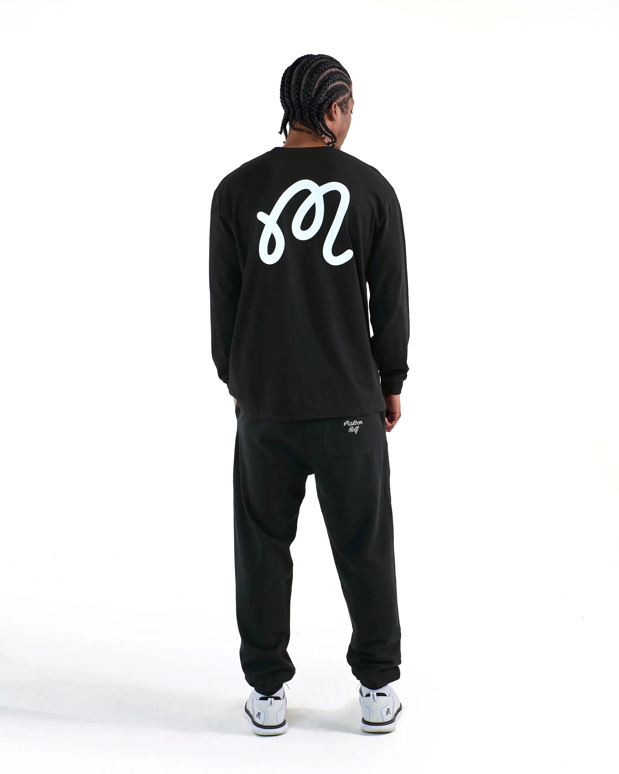Malbon Golf Gorse Cooper L/S Tee - Black on model at Gallery Streetwear Kelowna BC Canada