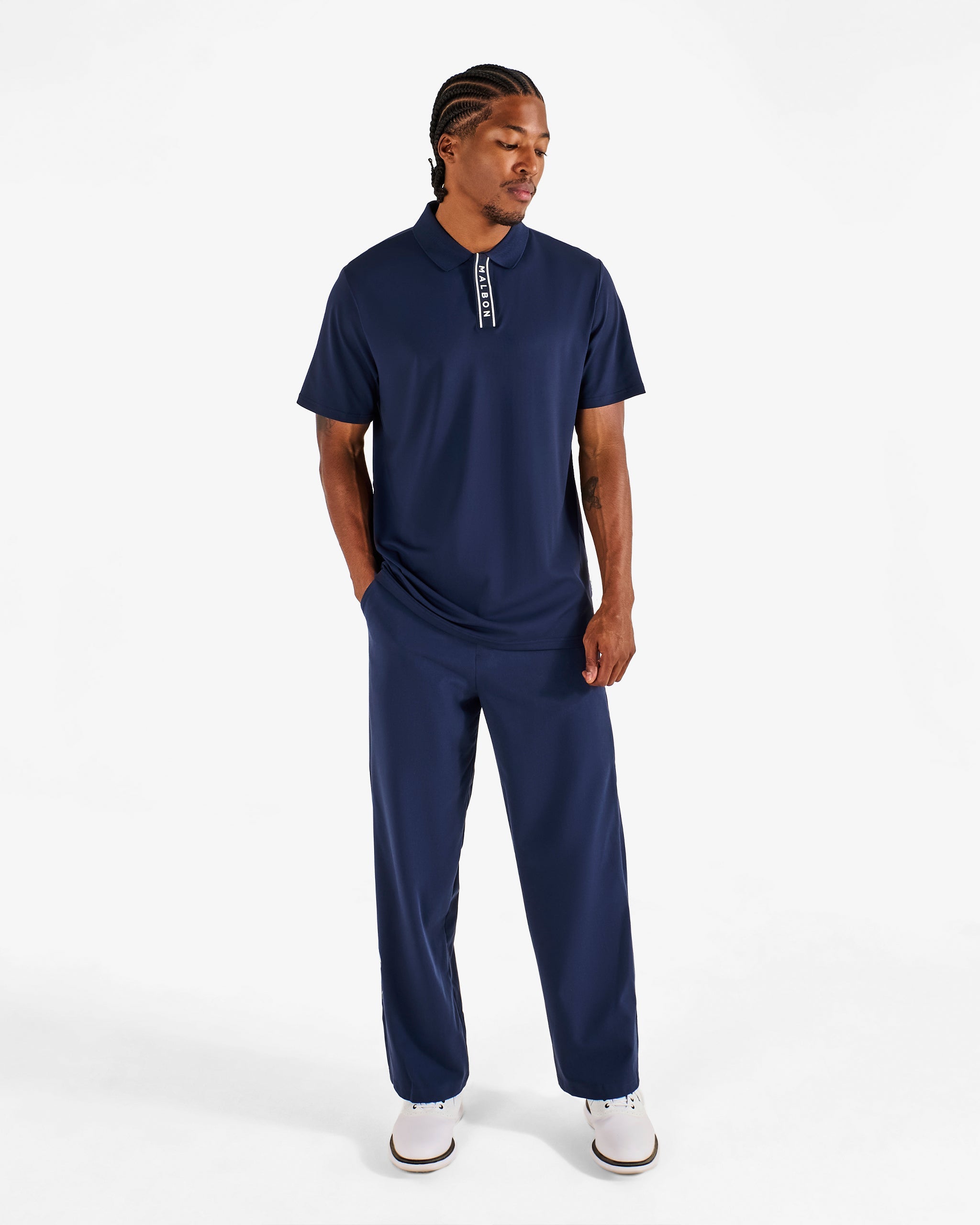 Malbon Golf Block Placket Polo Navy worn on model – tailored golf polo front
