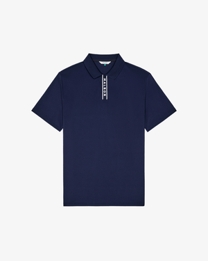 Malbon Golf Block Placket Polo in Navy – front view of the piqué golf polo with covered placket