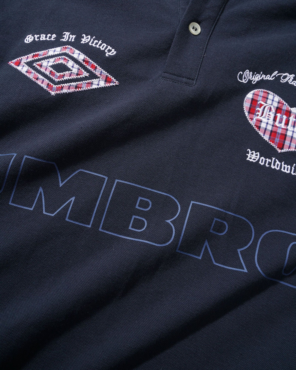 Butter Goods x Umbro Victory Polo Navy / Slate — product shot