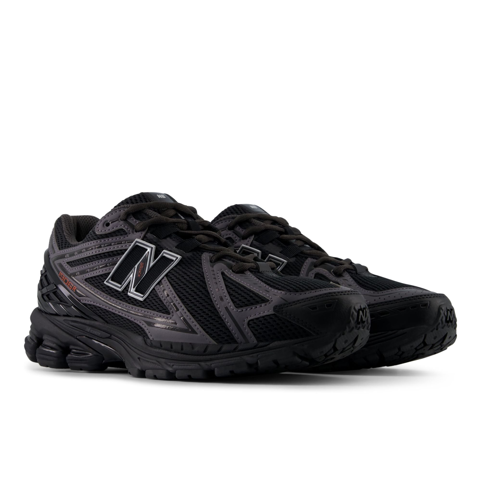 New Balance 1906R Black with Hot Tomato, front three-quarter view of the pair