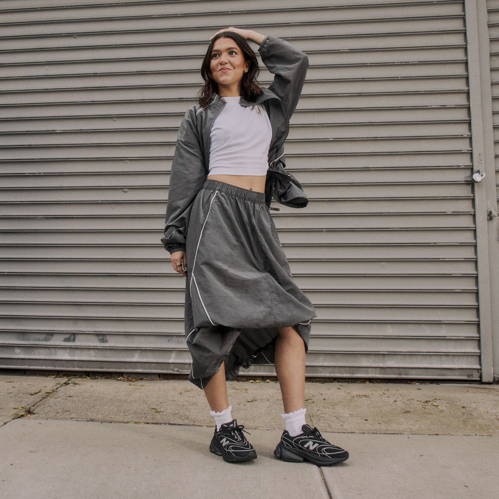 New Balance 5030 Black with Silver Metallic styled on model in a full outfit