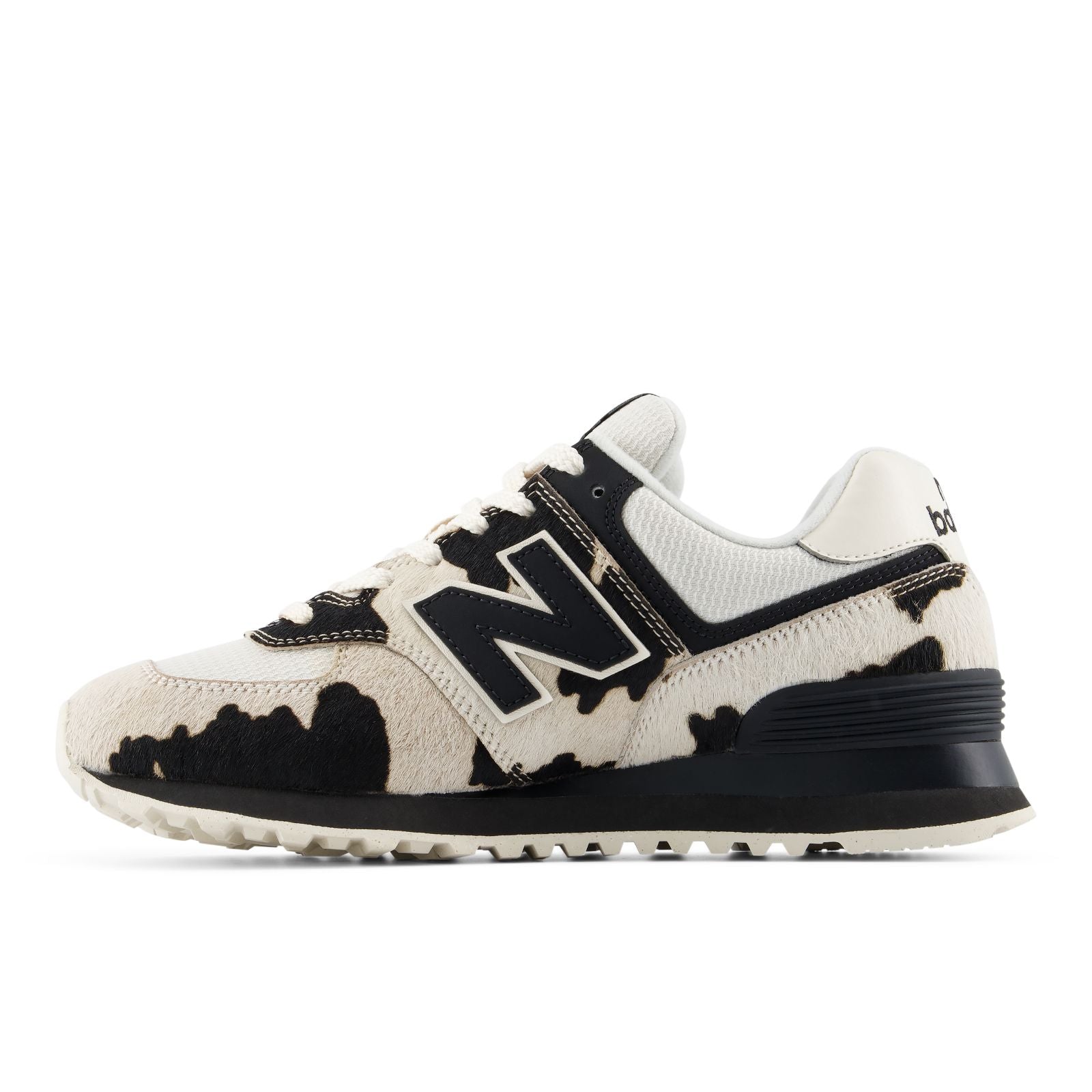 New Balance 574 cow print, medial side showing black suede N logo