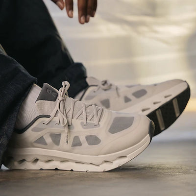 Close-up of an On Running Cloud sneaker at Gallery Streetwear, highlighting the brand’s true-to-size fit and cushioned Cloud sole for runners and sneaker fans in Canada.