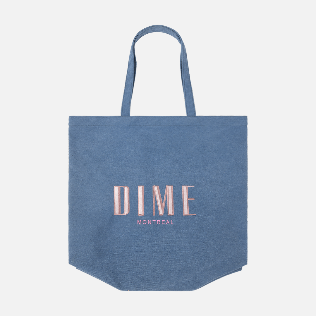 Dime MTL Montreal Tote Bag in Ocean blue, front view with printed graphic