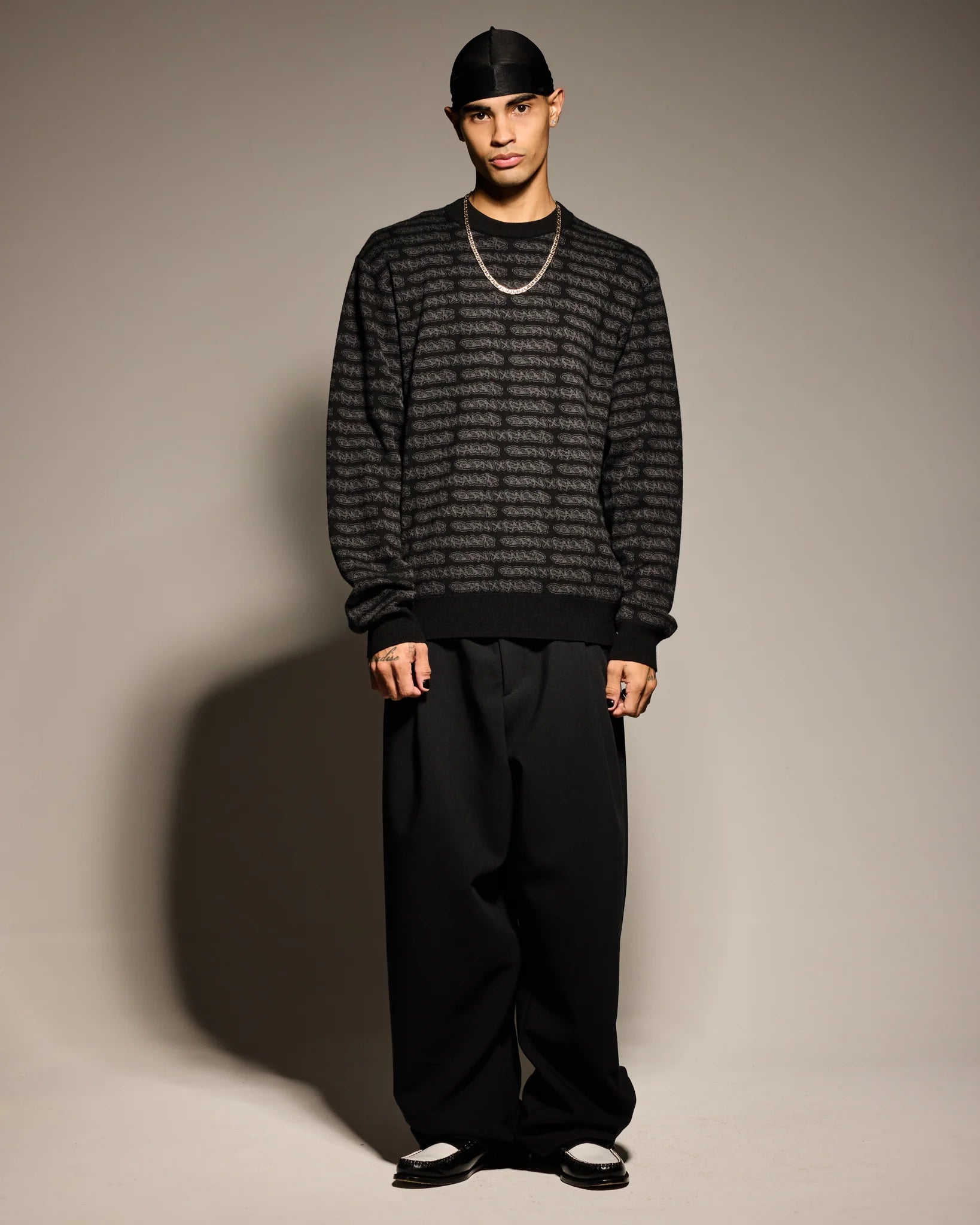 Born X Raised All-Over Tag Knit Sweater