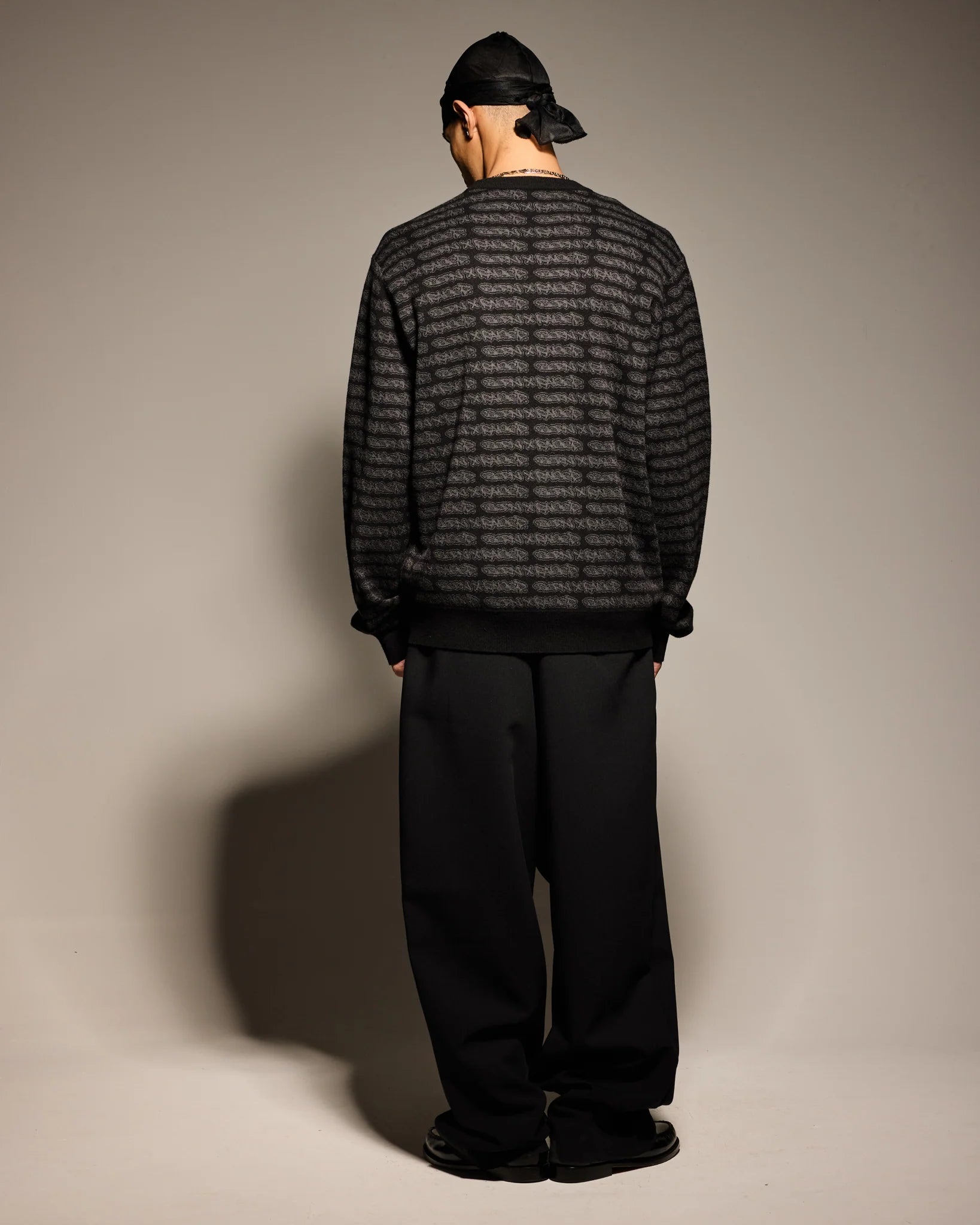 Born X Raised All-Over Tag Knit Sweater