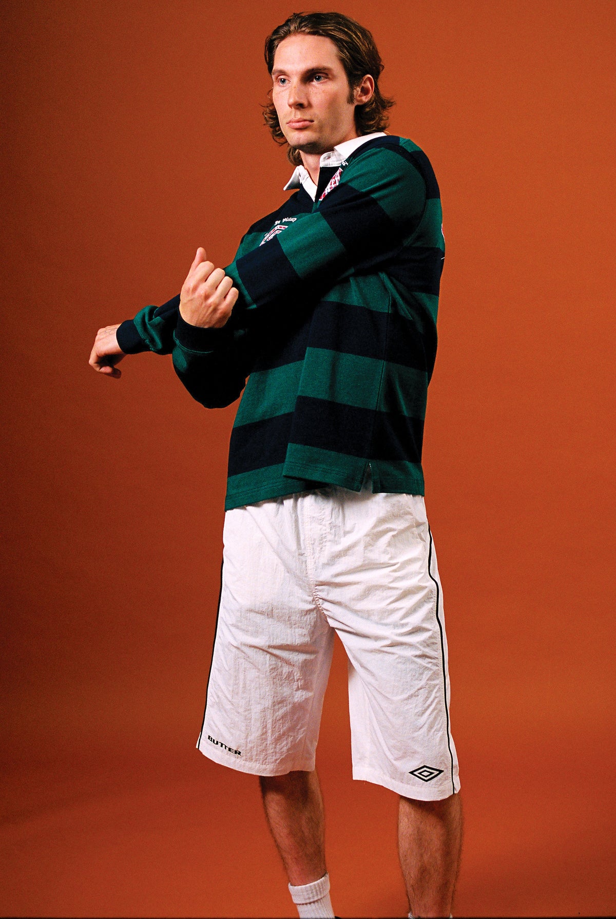 Butter Goods x Umbro Victory Rugby Polo Navy / Forest — worn by model