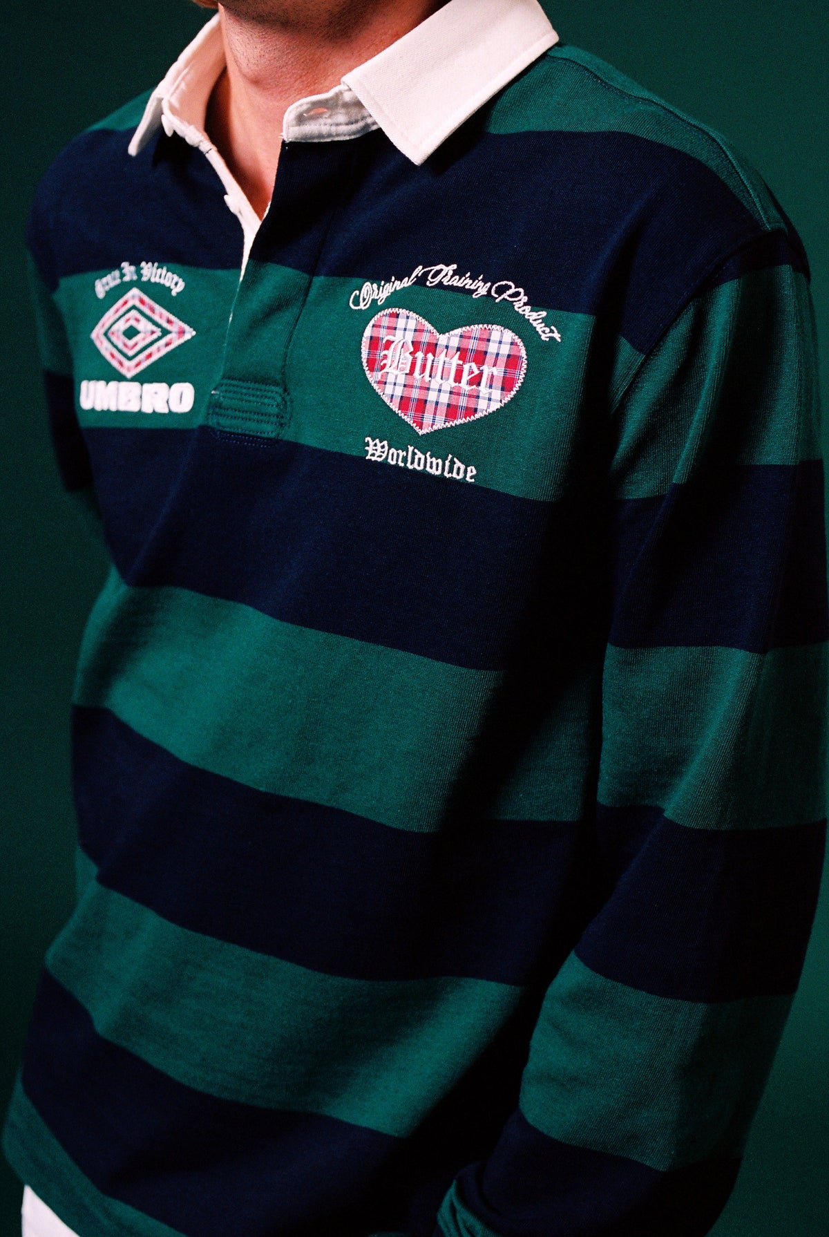 Butter Goods x Umbro Victory Rugby Polo Navy / Forest — worn by model