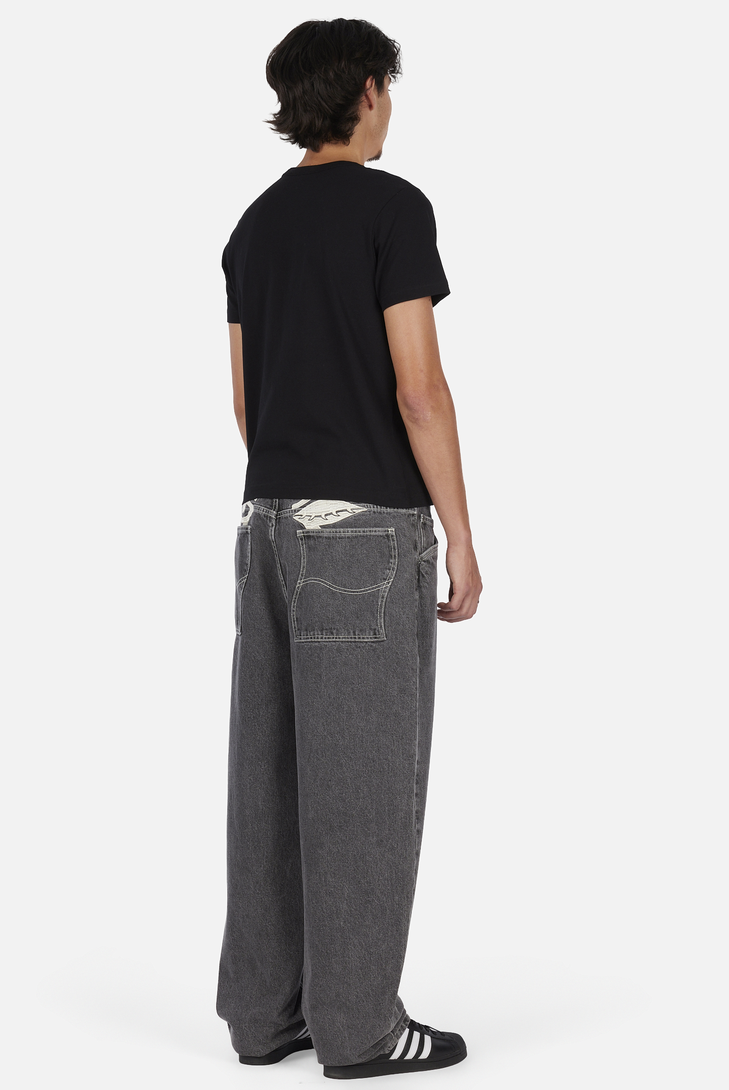 Dime MTL Baggy Wink Denim Pants Faded Black — worn by model
