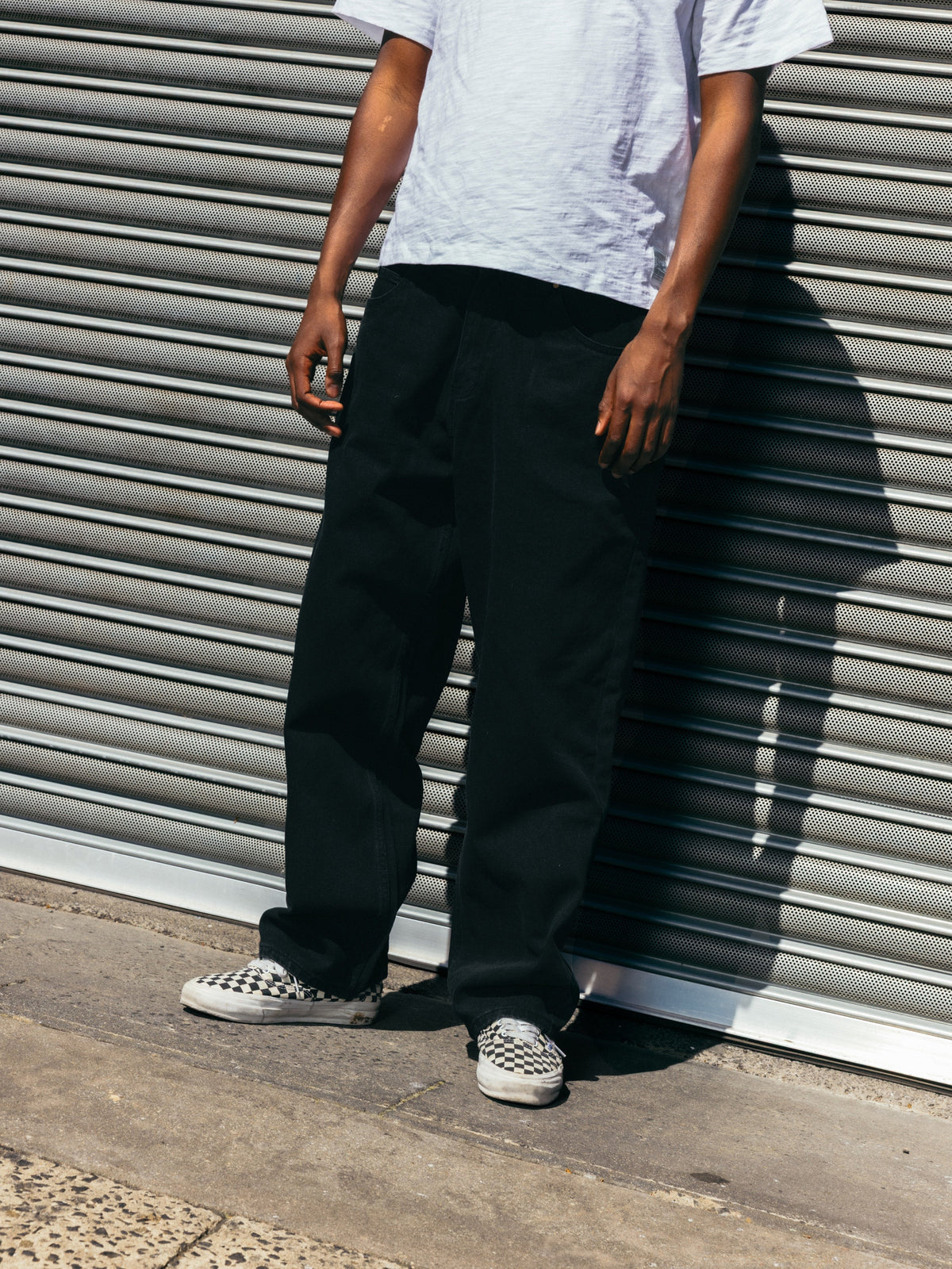 Butter Goods Baggy Denim Jeans Raw Indigo — worn by model