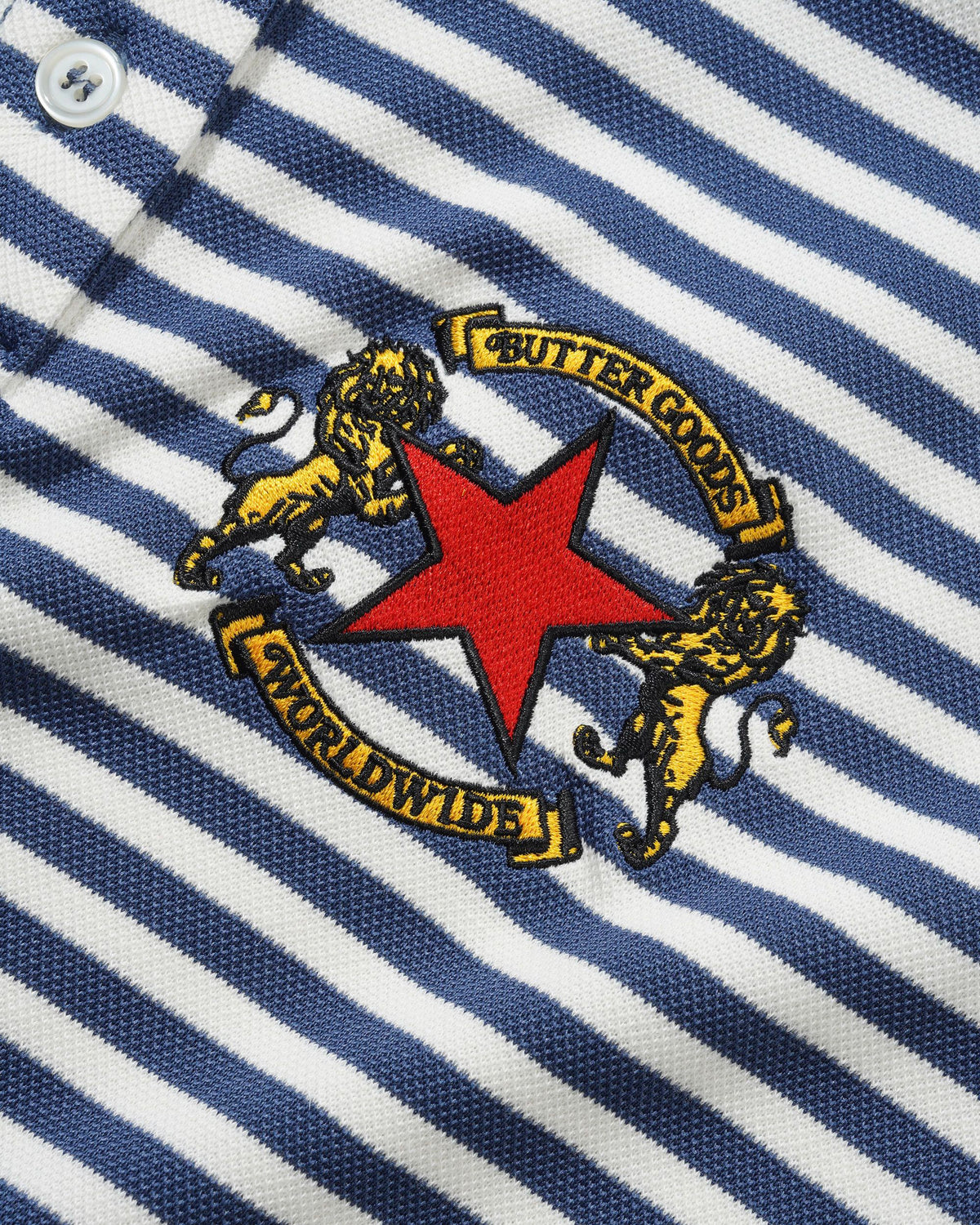 Butter Goods x Umbro Crest Polo Navy — product shot