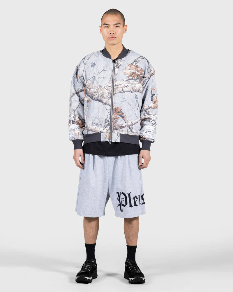 Pleasures | Dragon Bomber RealTree Camo Model