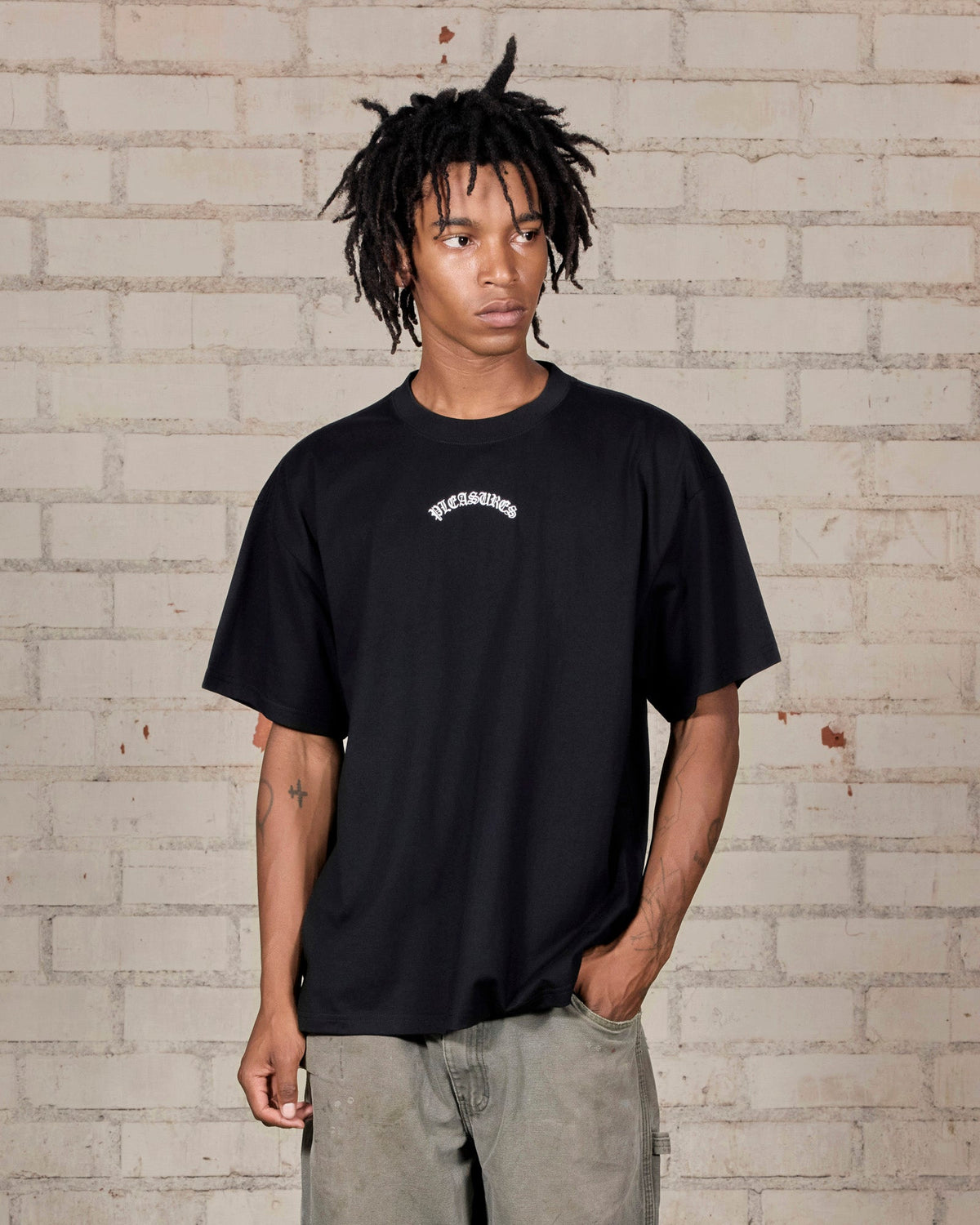 Pleasures Athor T-Shirt Black — black cotton t-shirt worn on model, Gallery Streetwear Canada
