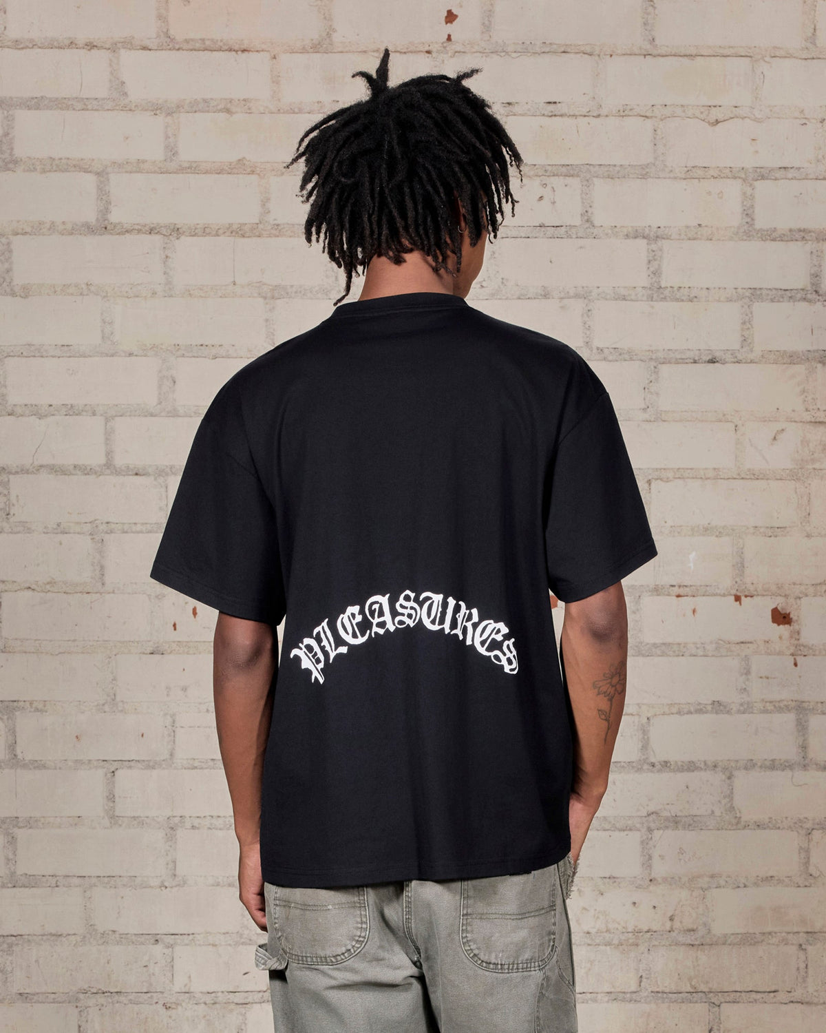 Pleasures Athor T-Shirt Black — black cotton t-shirt worn on model, Gallery Streetwear Canada