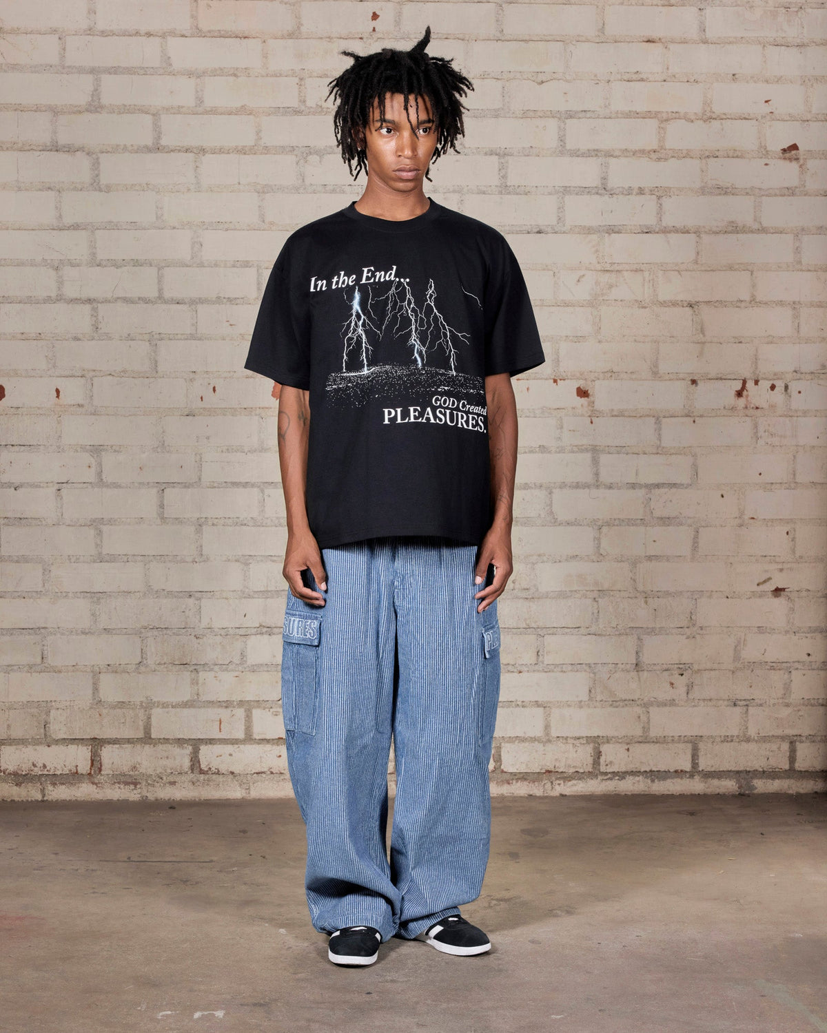 Pleasures End Times T-Shirt Black — black cotton t-shirt worn on model, Gallery Streetwear Canada