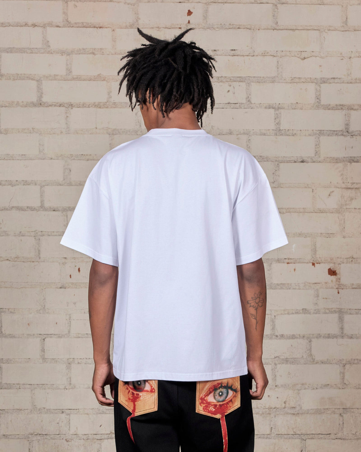 Pleasures Devotion T-Shirt White — white cotton t-shirt worn on model, Gallery Streetwear Canada