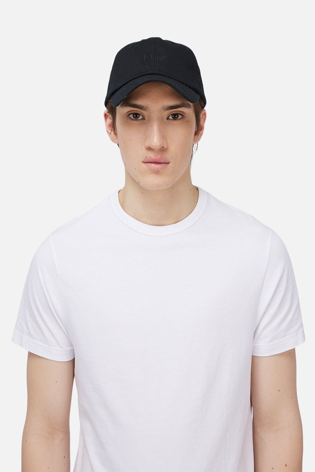 Model wearing the Dime MTL Classic Low Pro Cap in Black