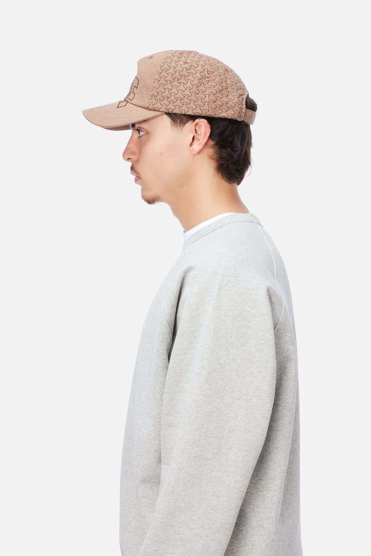 Dime MTL Allover Stitch Worker Cap Tan — worn by model