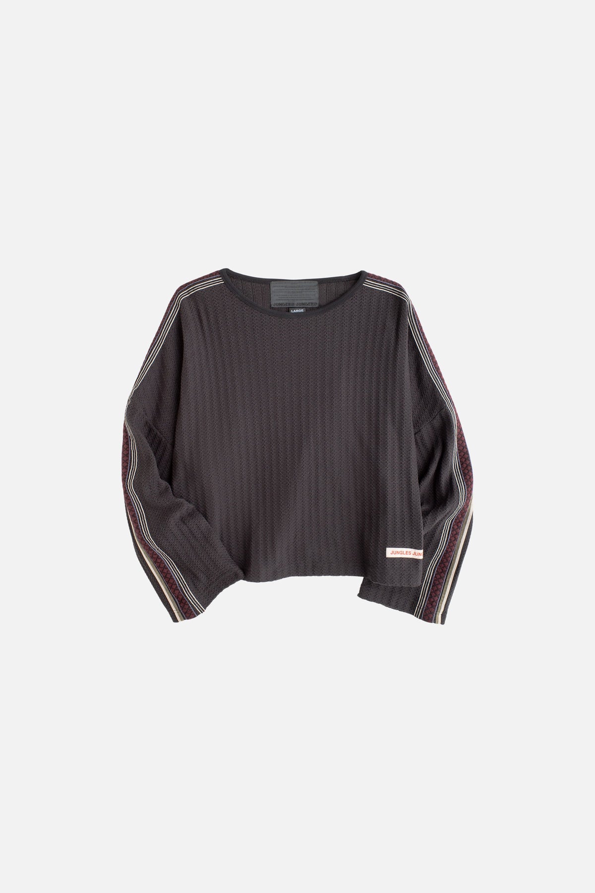 Jungles Jungles Triple Tape Knit in black, front view with triple woven sleeve taping