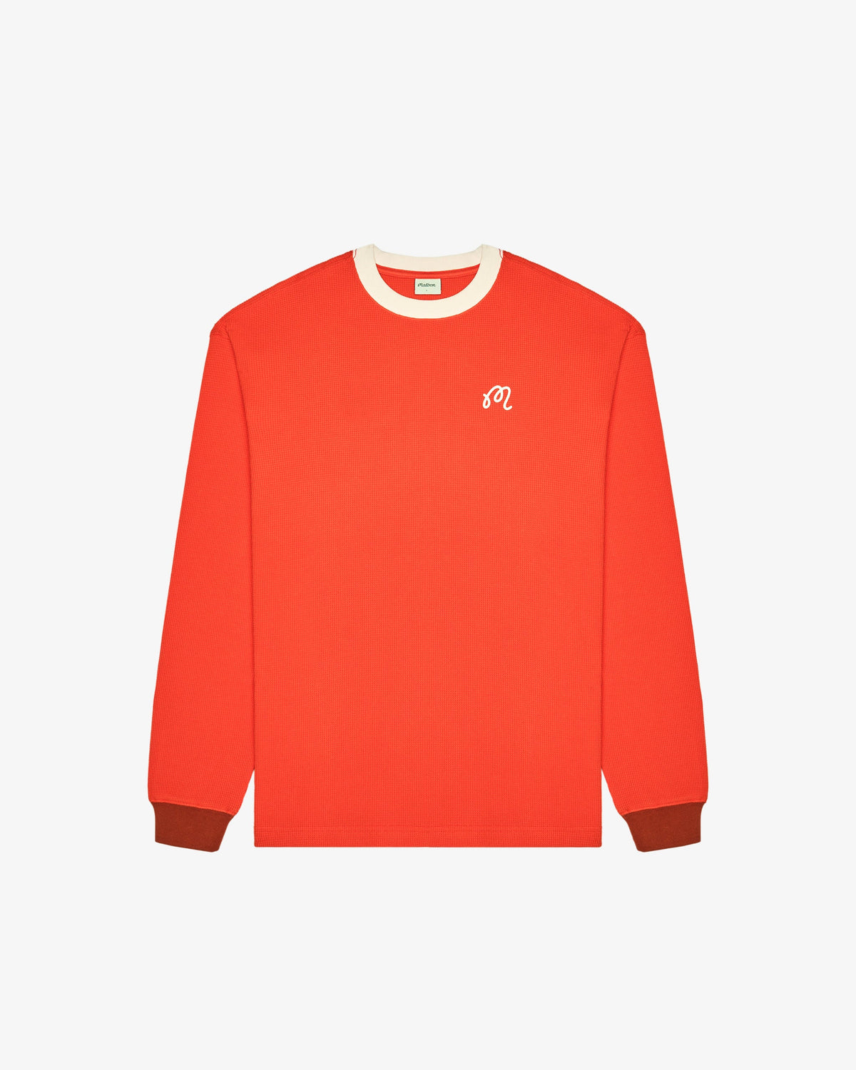 Malbon Golf Gorse Heritage Long Sleeve in orange red, front view, showing cream contrast collar, rust contrast cuffs and embroidered M script logo on the left chest