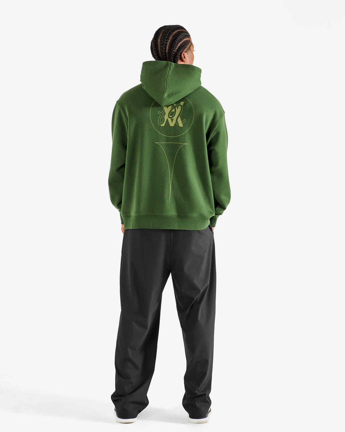 Malbon Golf x Daniel Arsham Shards Hoodie – Olive Stealth Camo worn on model — olive camo pullover hoodie with Arsham shards graphic, Gallery Streetwear Canada