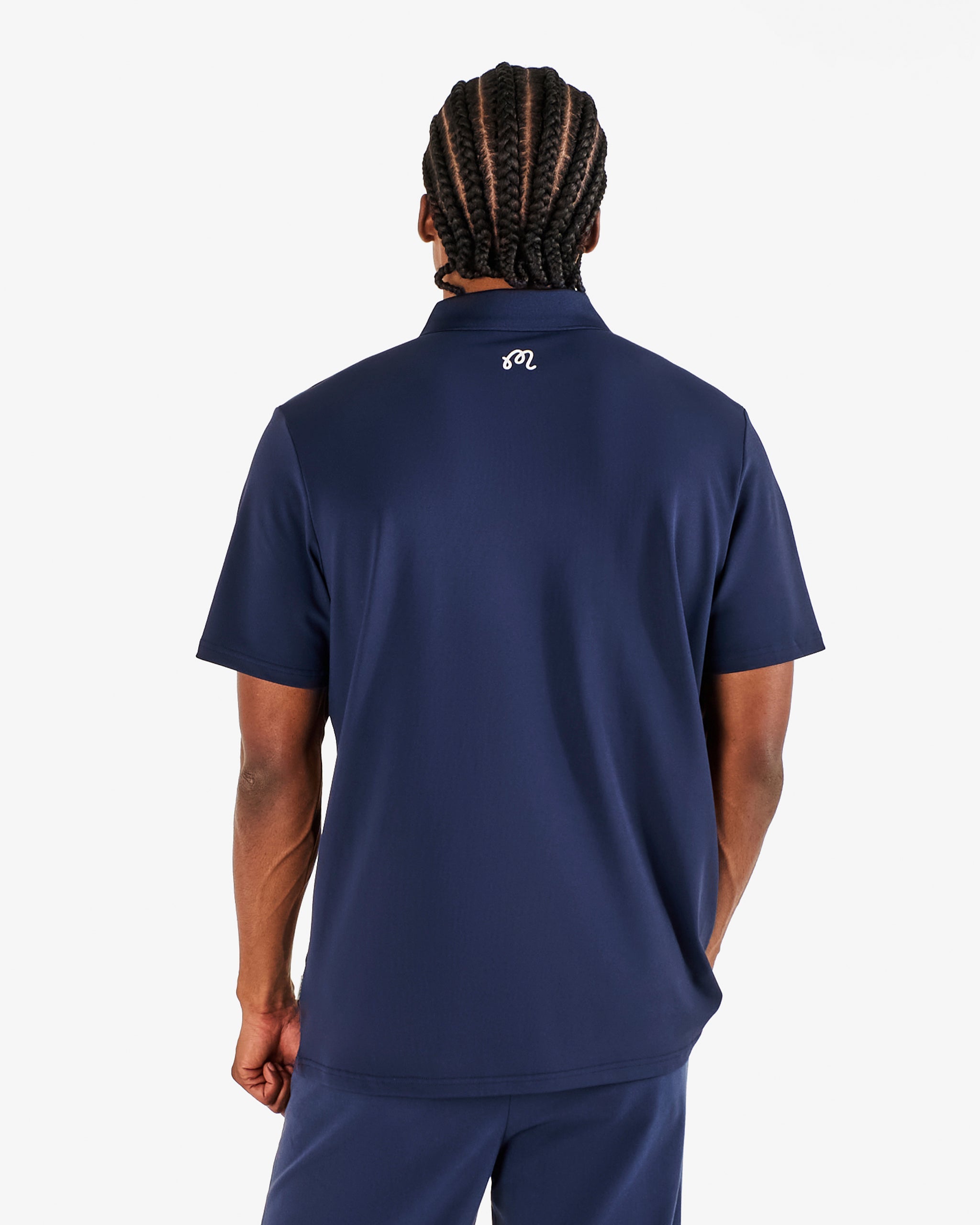 Malbon Golf Block Placket Polo Navy – detail of the covered placket and collar