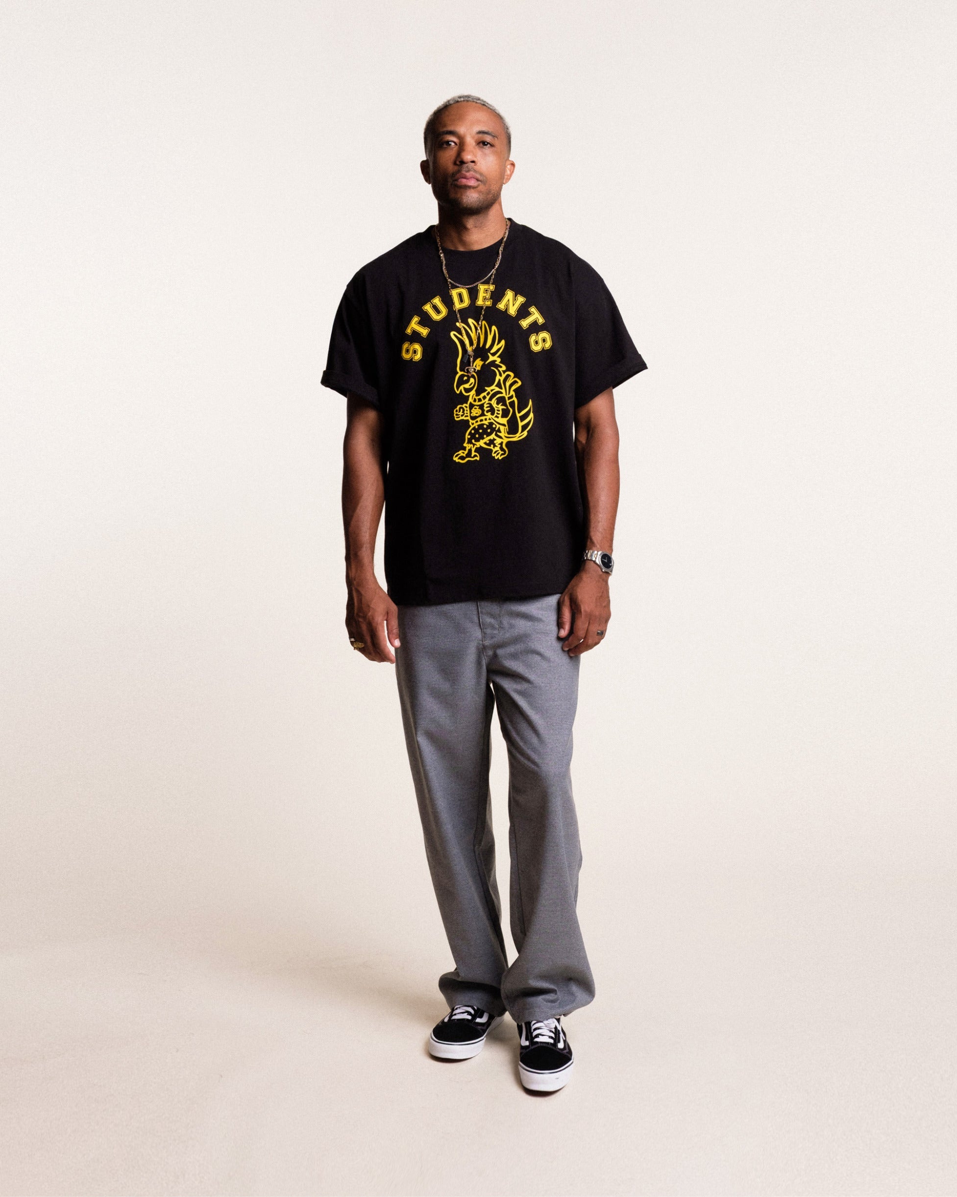 Model wearing Students Golf Chippy black t-shirt, front view