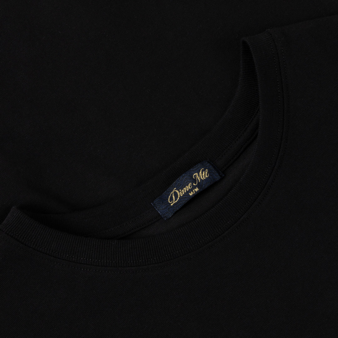 Detail of the Dime spiked logo print on the Black Classic Spiked T-Shirt