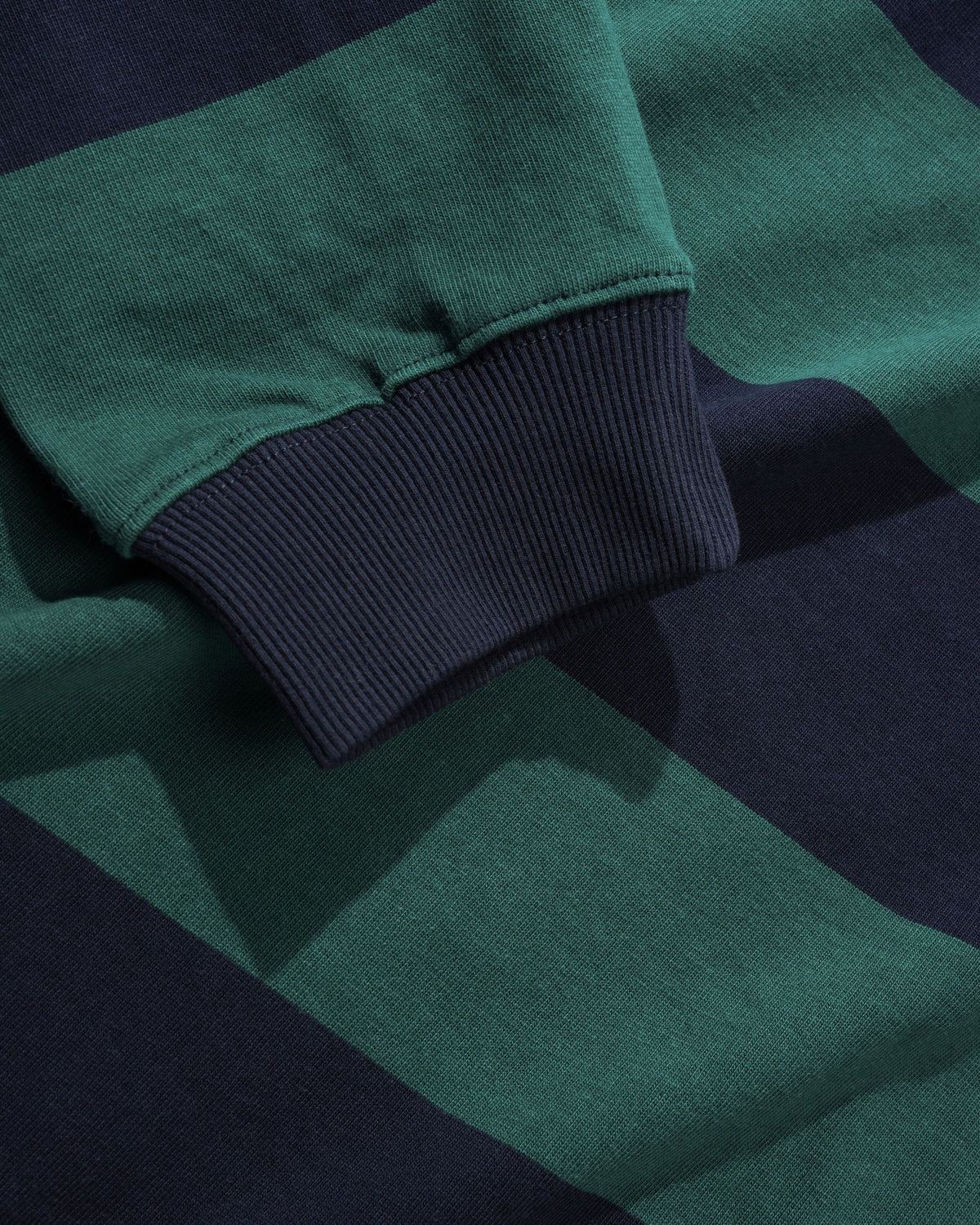 Butter Goods x Umbro Victory Rugby Polo Navy / Forest — product shot