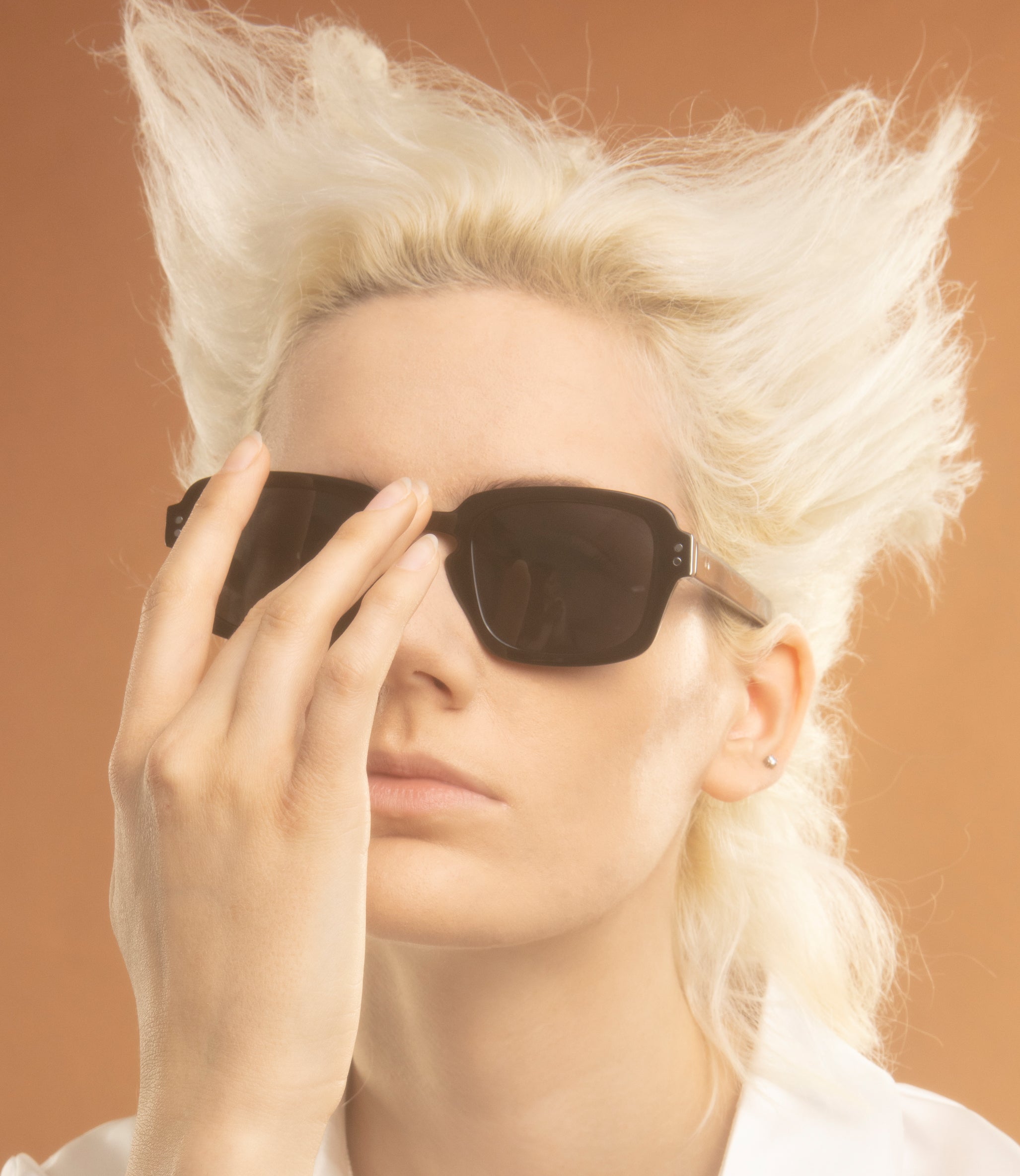 Spitfire Cut Fifteen black sunglasses worn, angled view