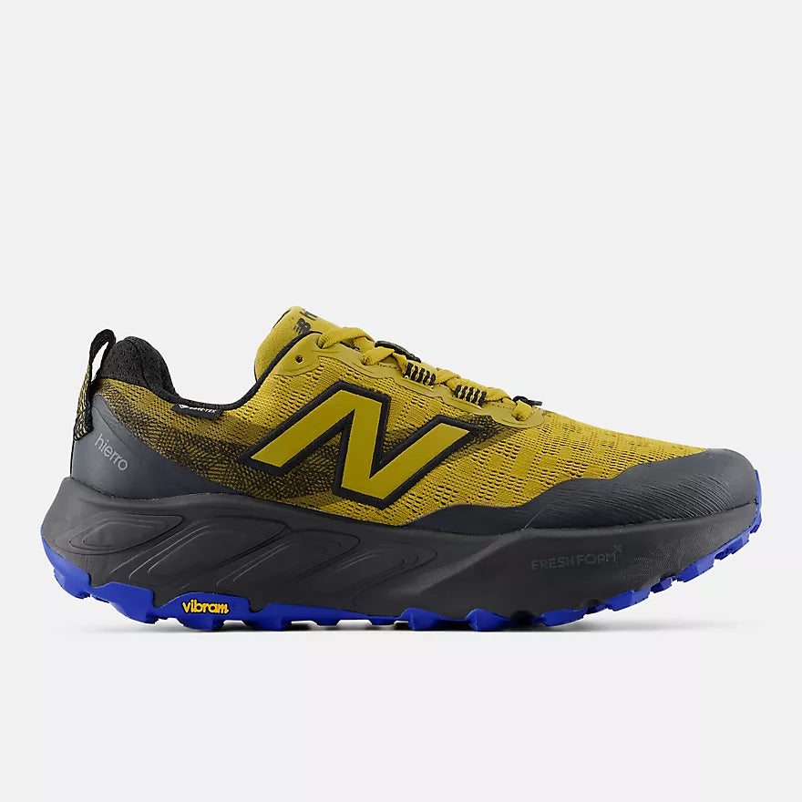 New Balance Men's Hierro v9 GORE-TEX trail shoe in olive with black overlays, lateral side profile