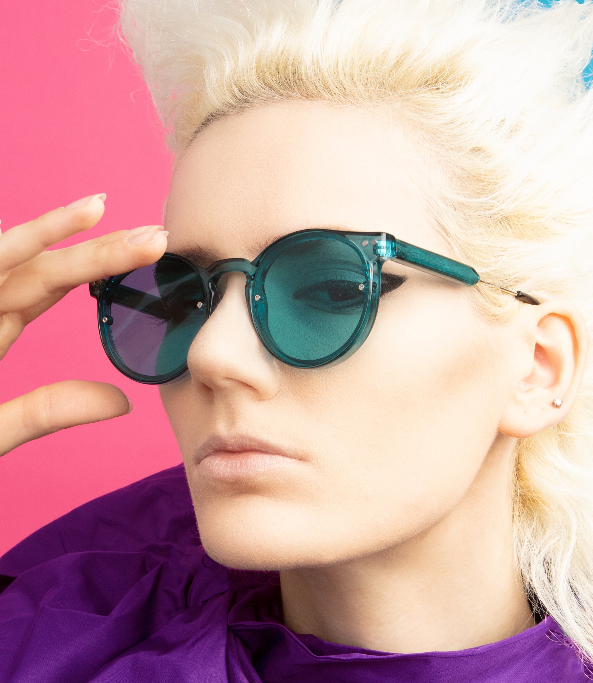 Spitfire Post Punk aqua sunglasses worn, angled view