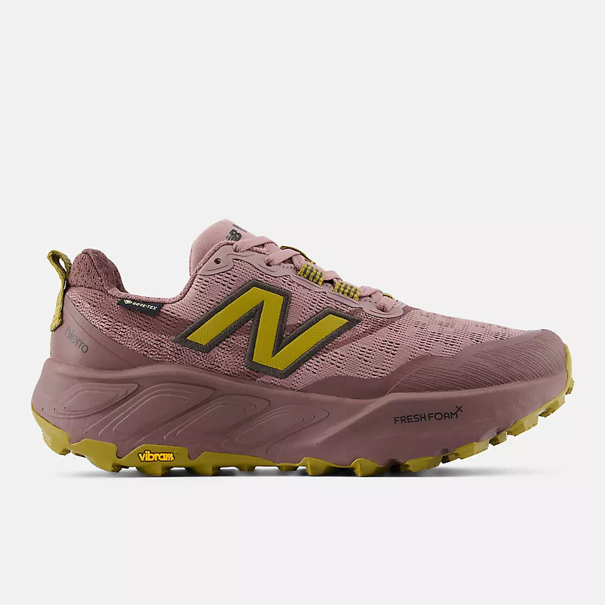 New Balance Women's Hierro v9 GORE-TEX trail shoe in mauve with a citron green N, lateral side profile